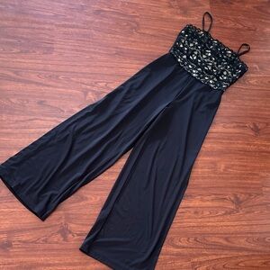 Shape FX Black and Cream Floral Jumpsuit w adjustable straps. Very slimming